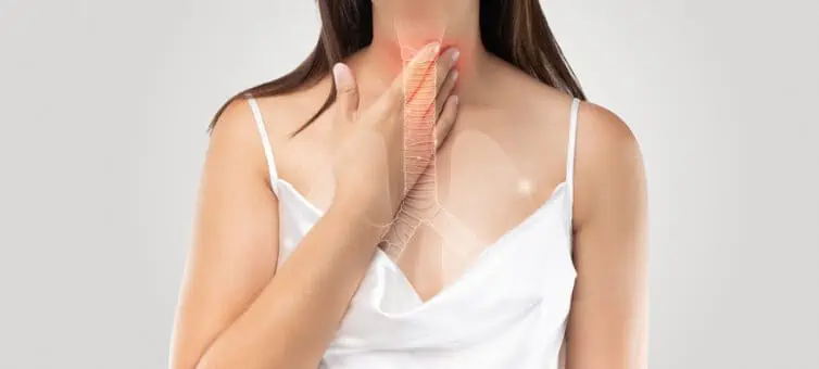 Woman touching her throat