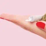 Cannabis roll and leaf in hand