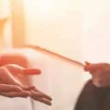 Someone counselling an individual