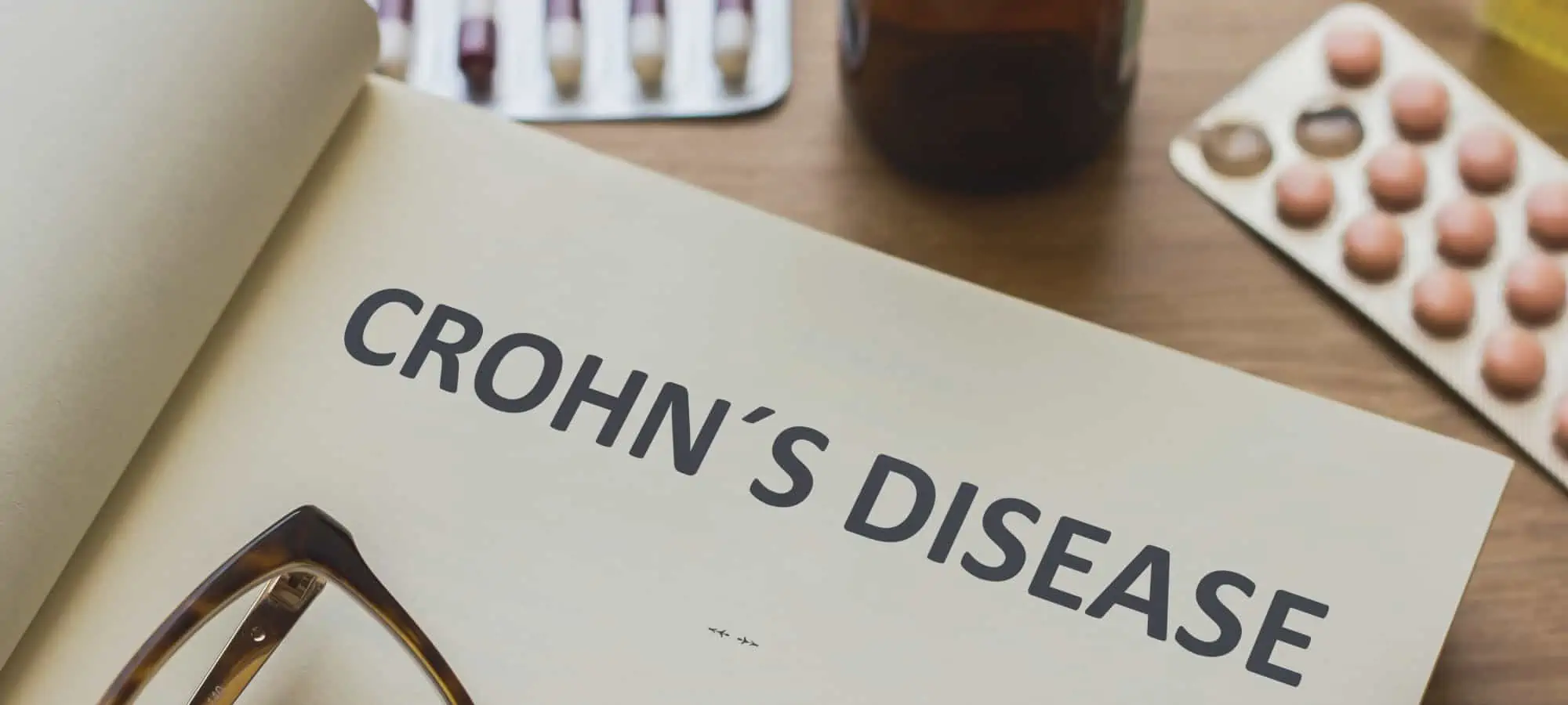 Notebook with Crohn's disease written on it