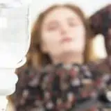 Girl getting an infusion in hospital