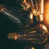 Lightbulbs shining with a black background