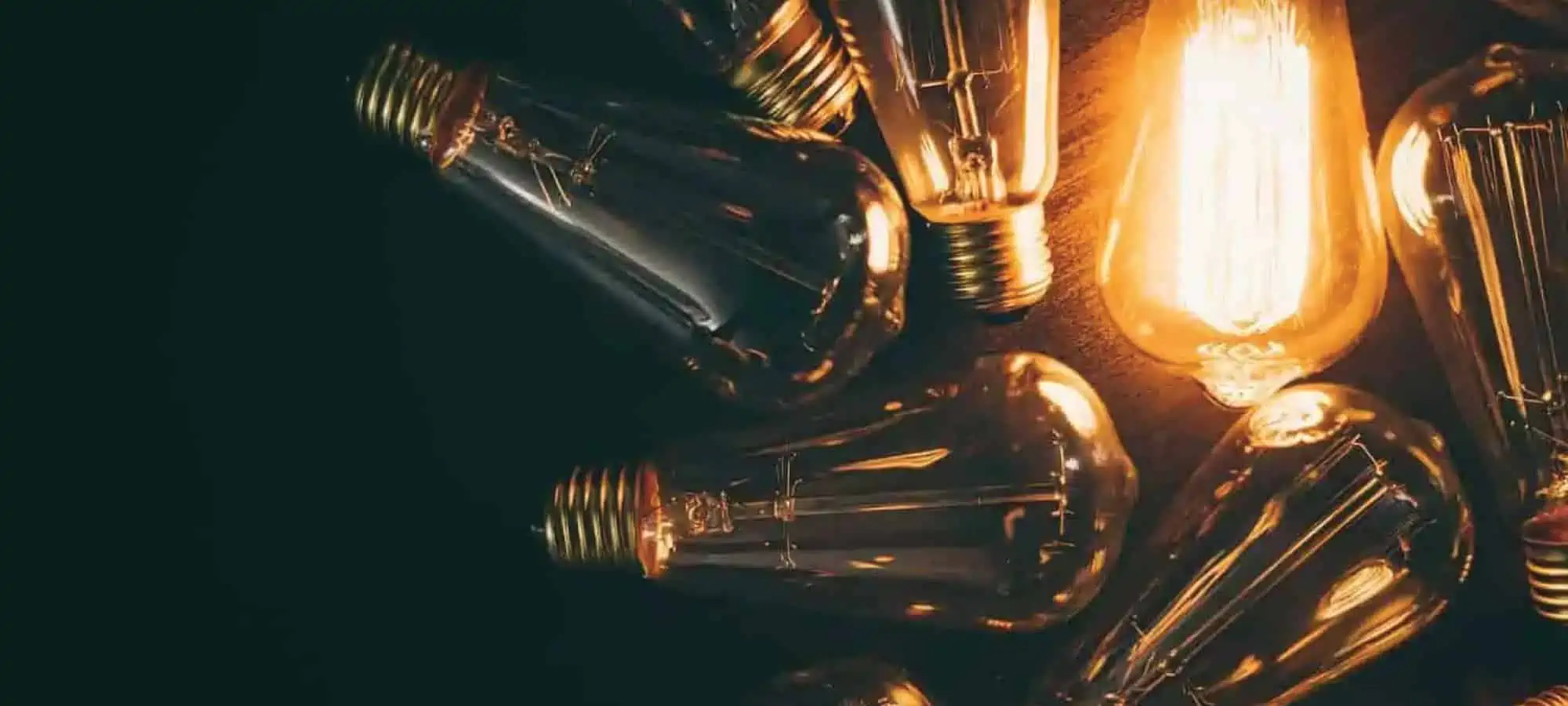 Lightbulbs shining with a black background
