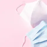 masks on pink background