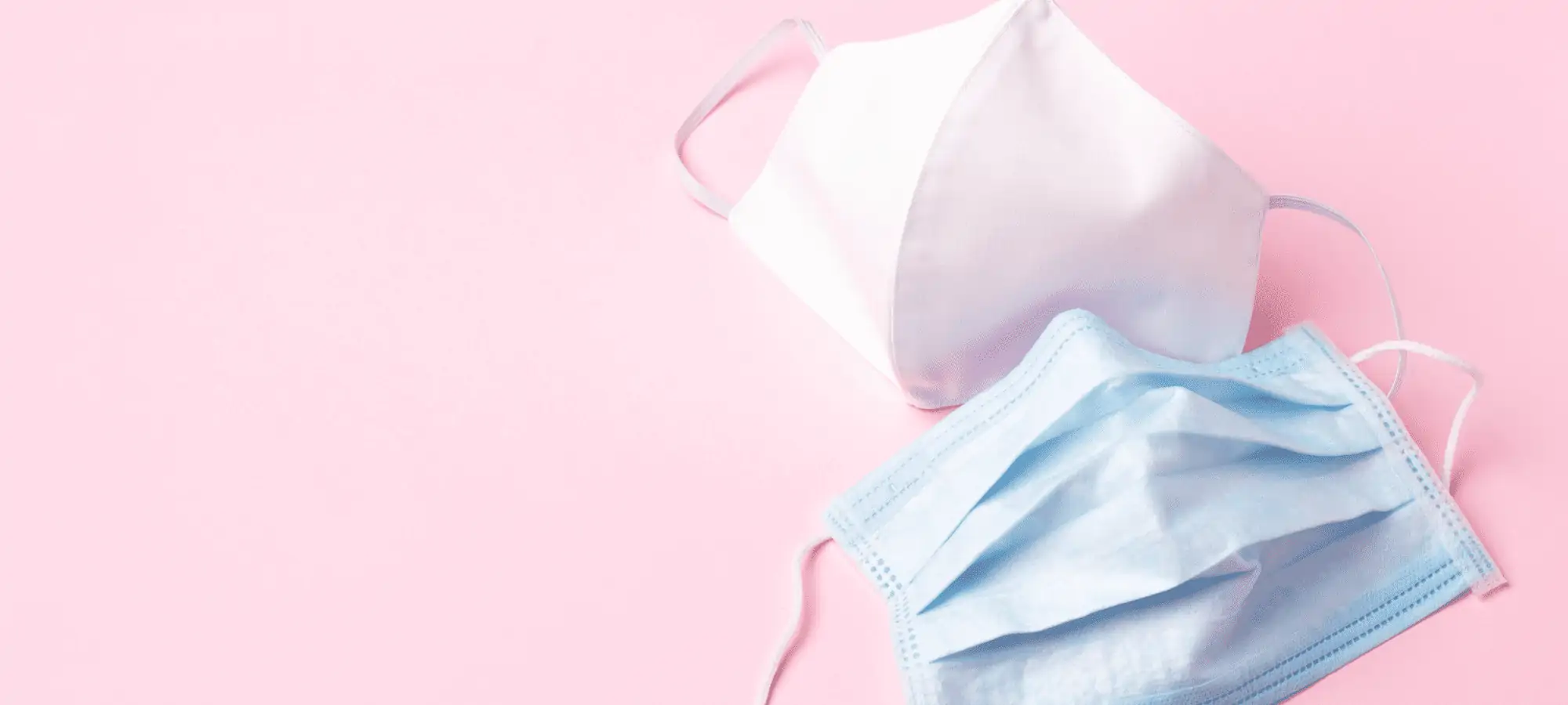 masks on pink background