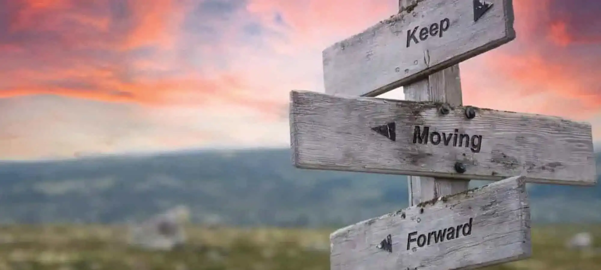 sign that says keep moving forward outside