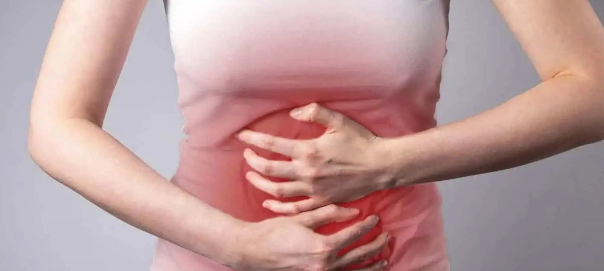 Women holding stomach with red pain