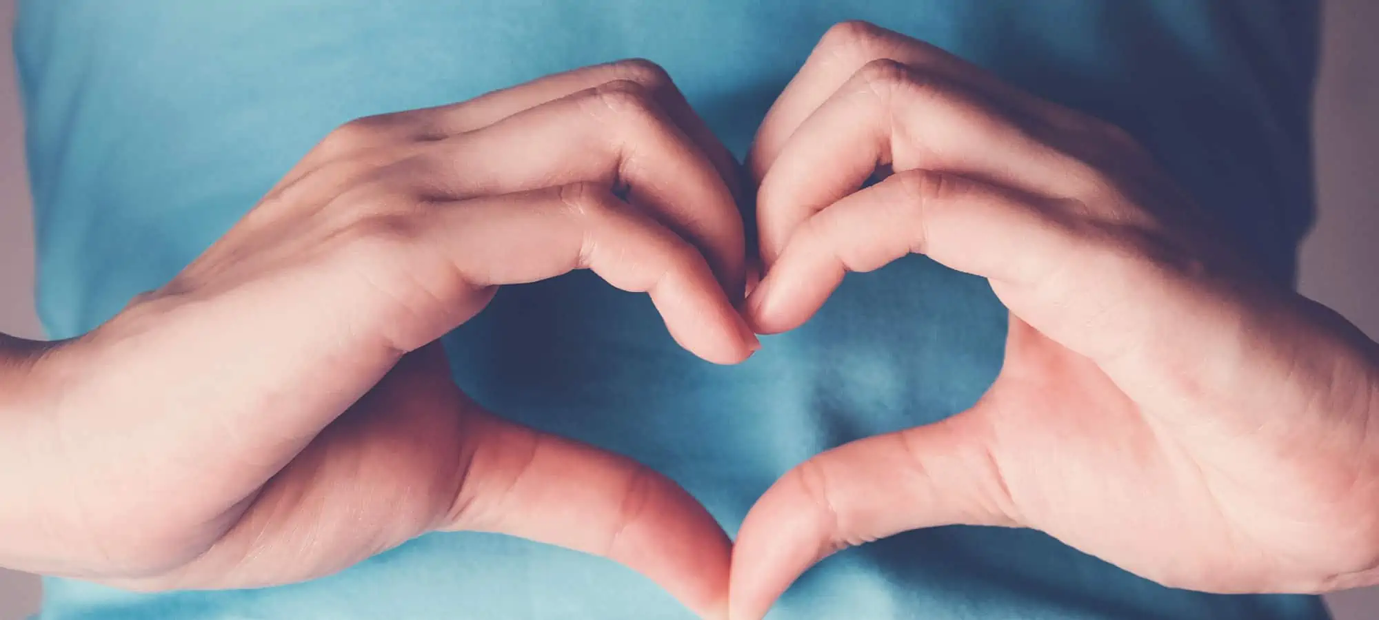 Heart over tummy