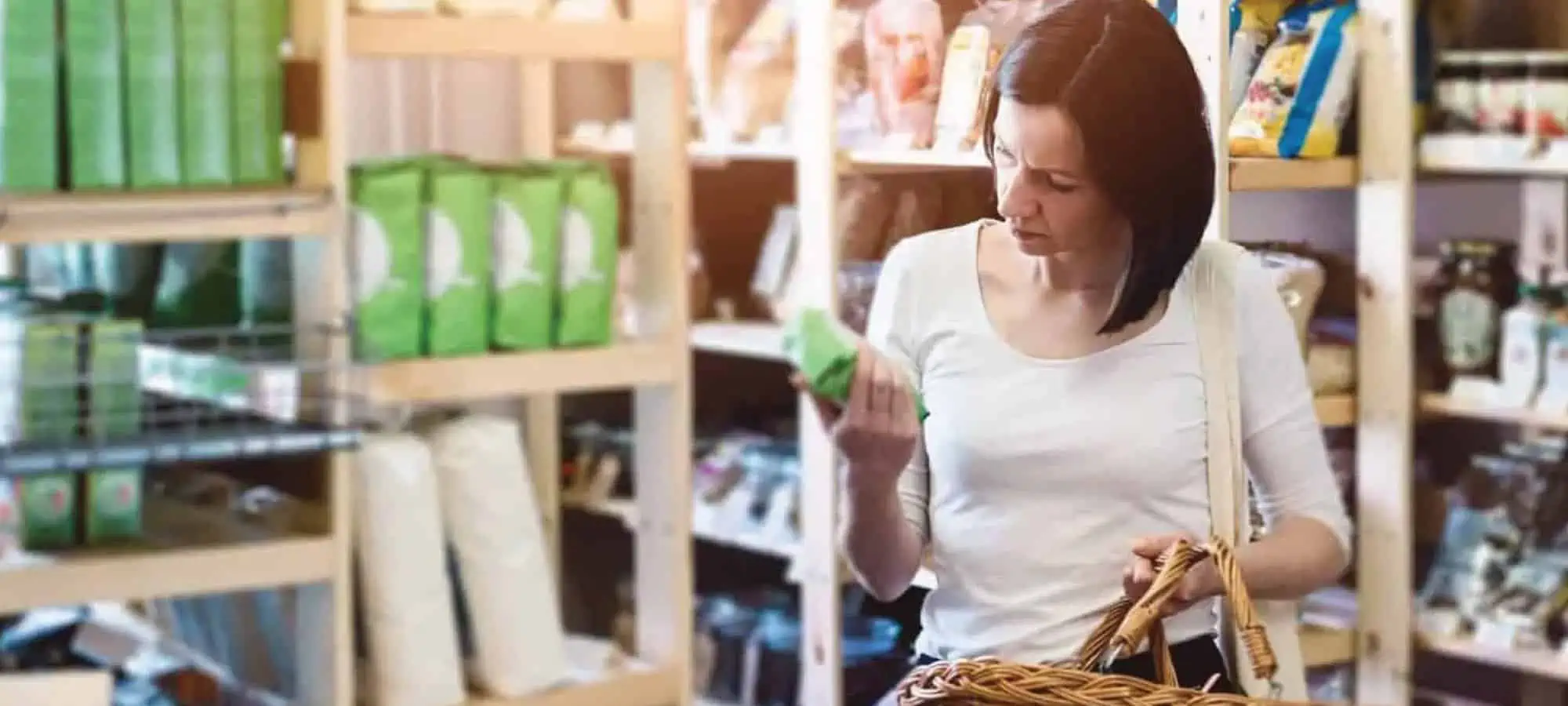 Women looking at labels in the grocer store