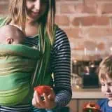 Mom and son making food in the kitchen