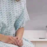 Women sitting in robe