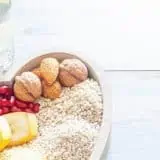 A weight, and food in a heart shaped bowl
