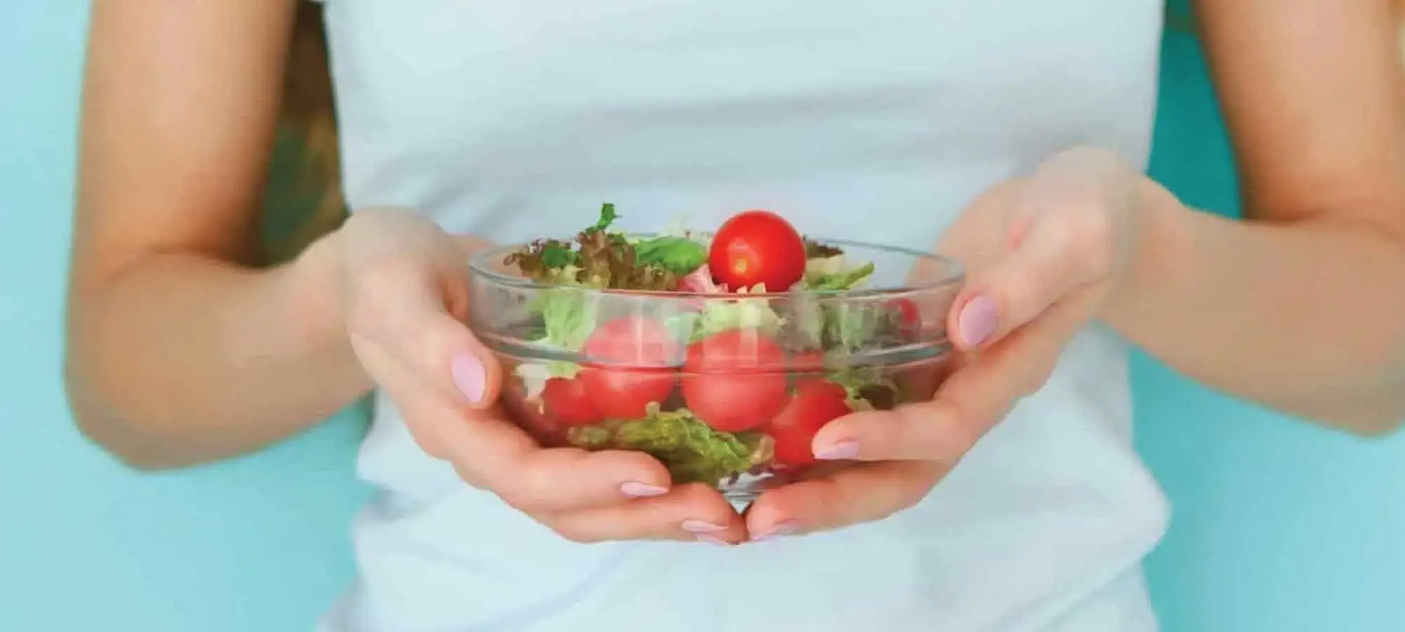 Women holding a salad