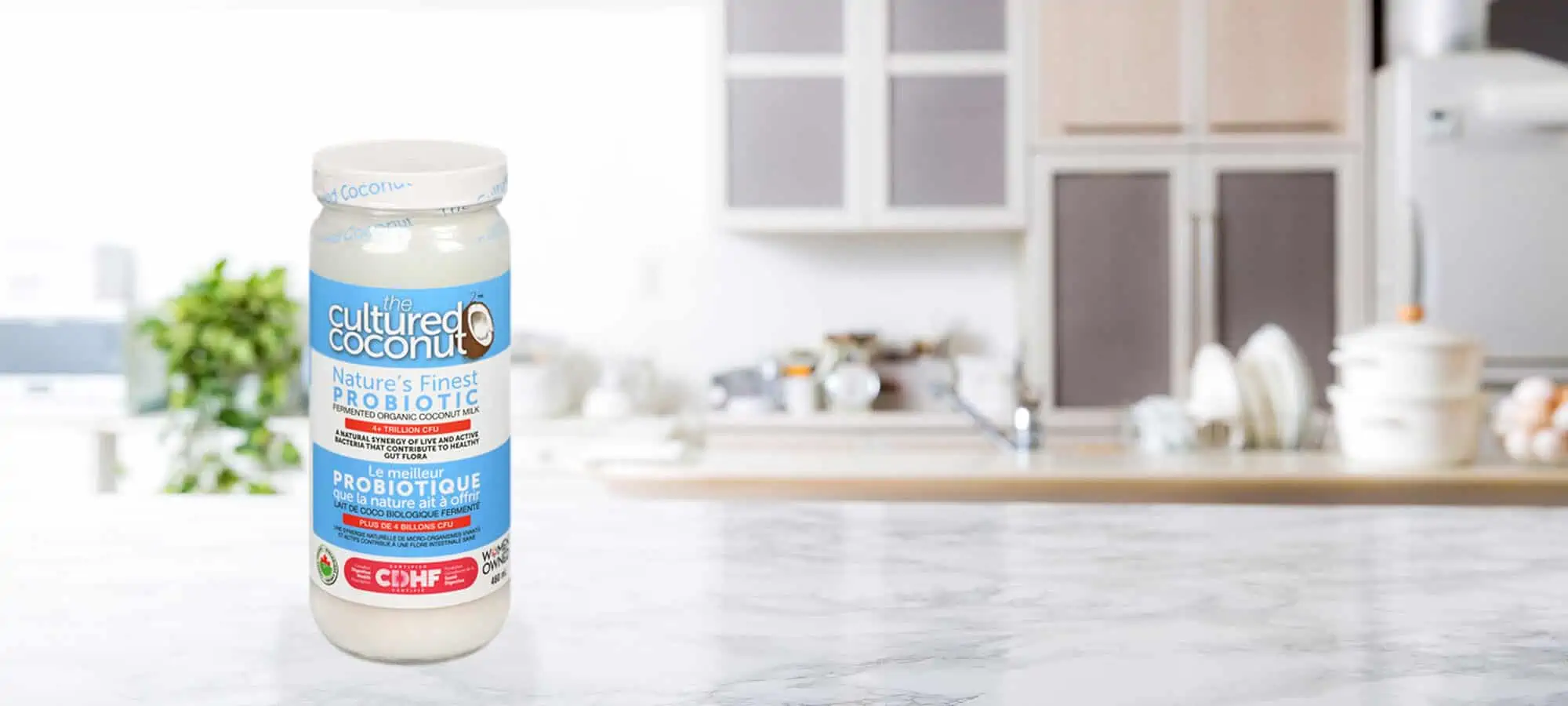 The Cultured Coconut bottle on a kitchen counter