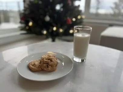 brown butter cookies and milk in front of a Christmas tree