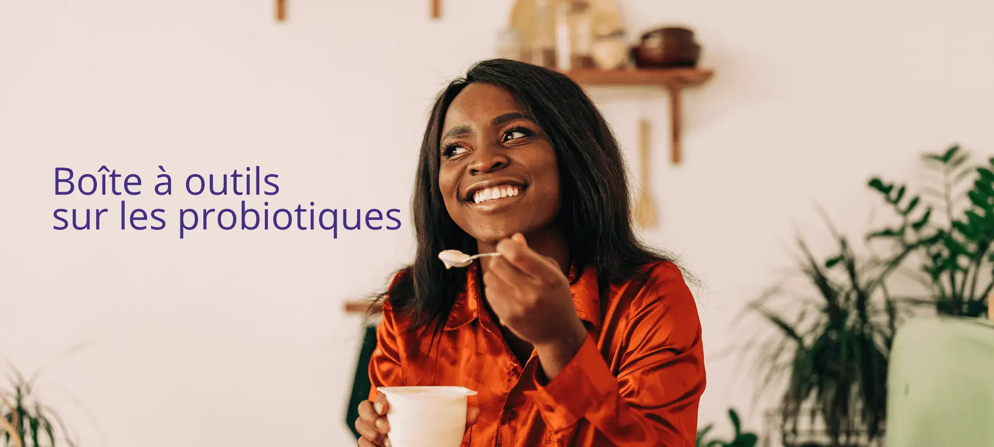 woman eating yogurt with probiotics