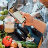 man looking at recipe for IBS foods to make