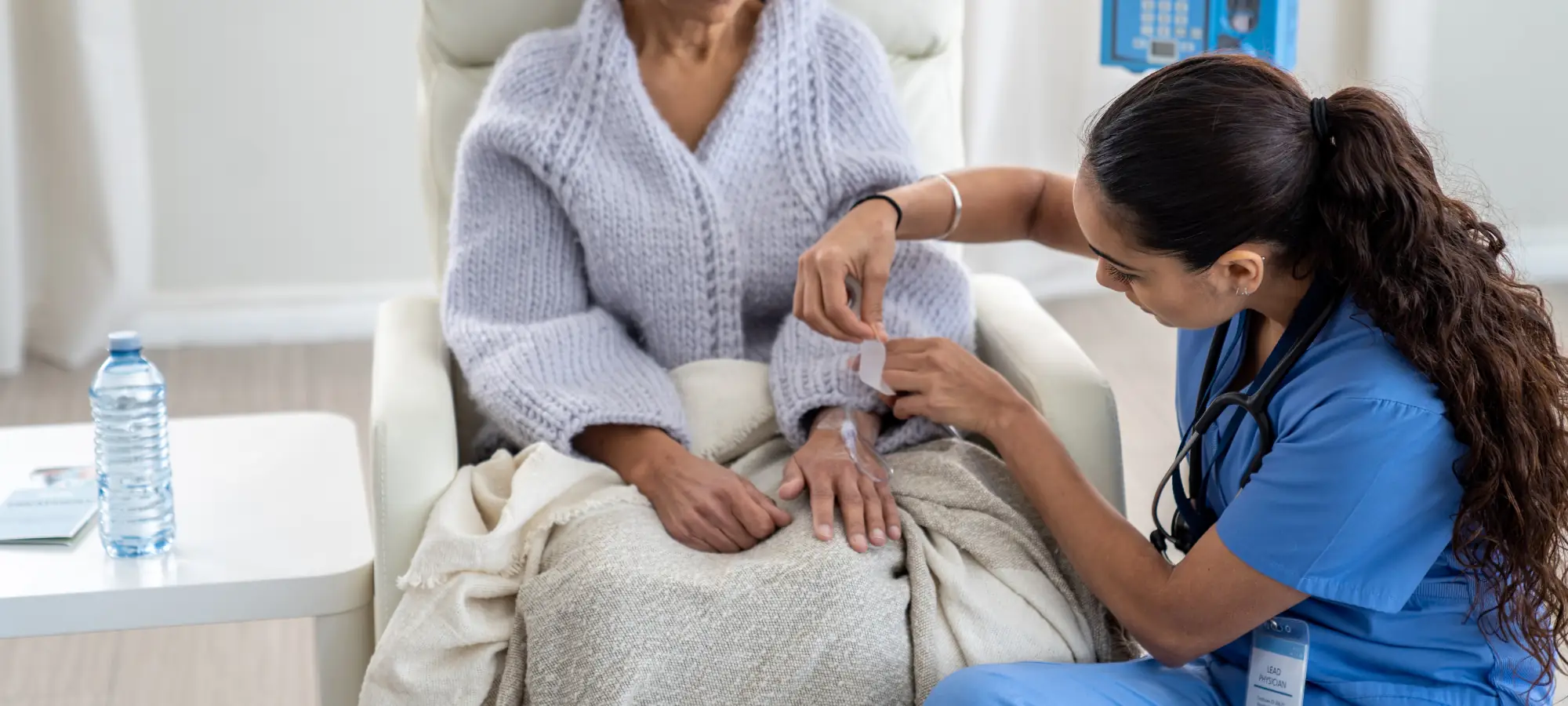 doctor assisting patient with gi cancers