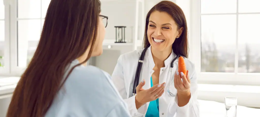 patient talking to dietitian about foods for constipation