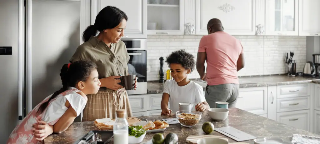 travelling gluten-free family in kitchen cooking