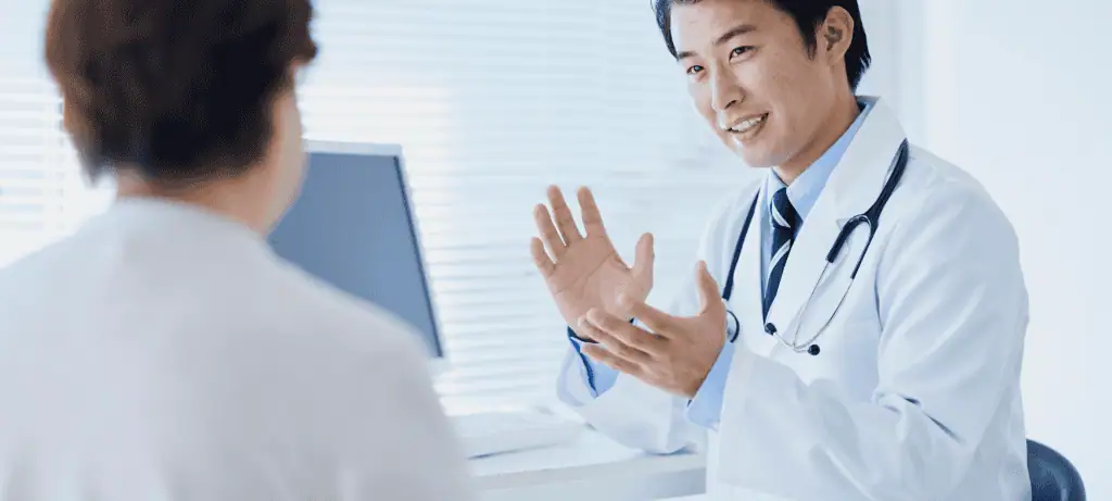Doctor speaking with their patient