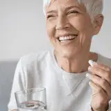 Women taking a multivitamin